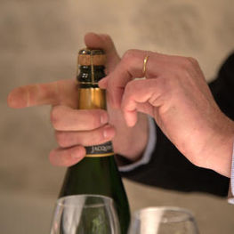 JM Jacquinot opening Champagne Bottle